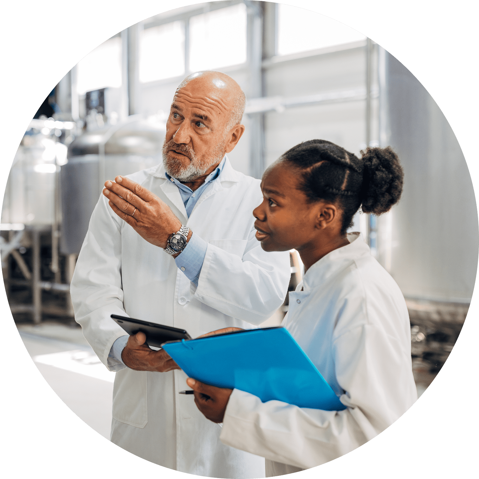 Scientists discussing research in a laboratory setting.