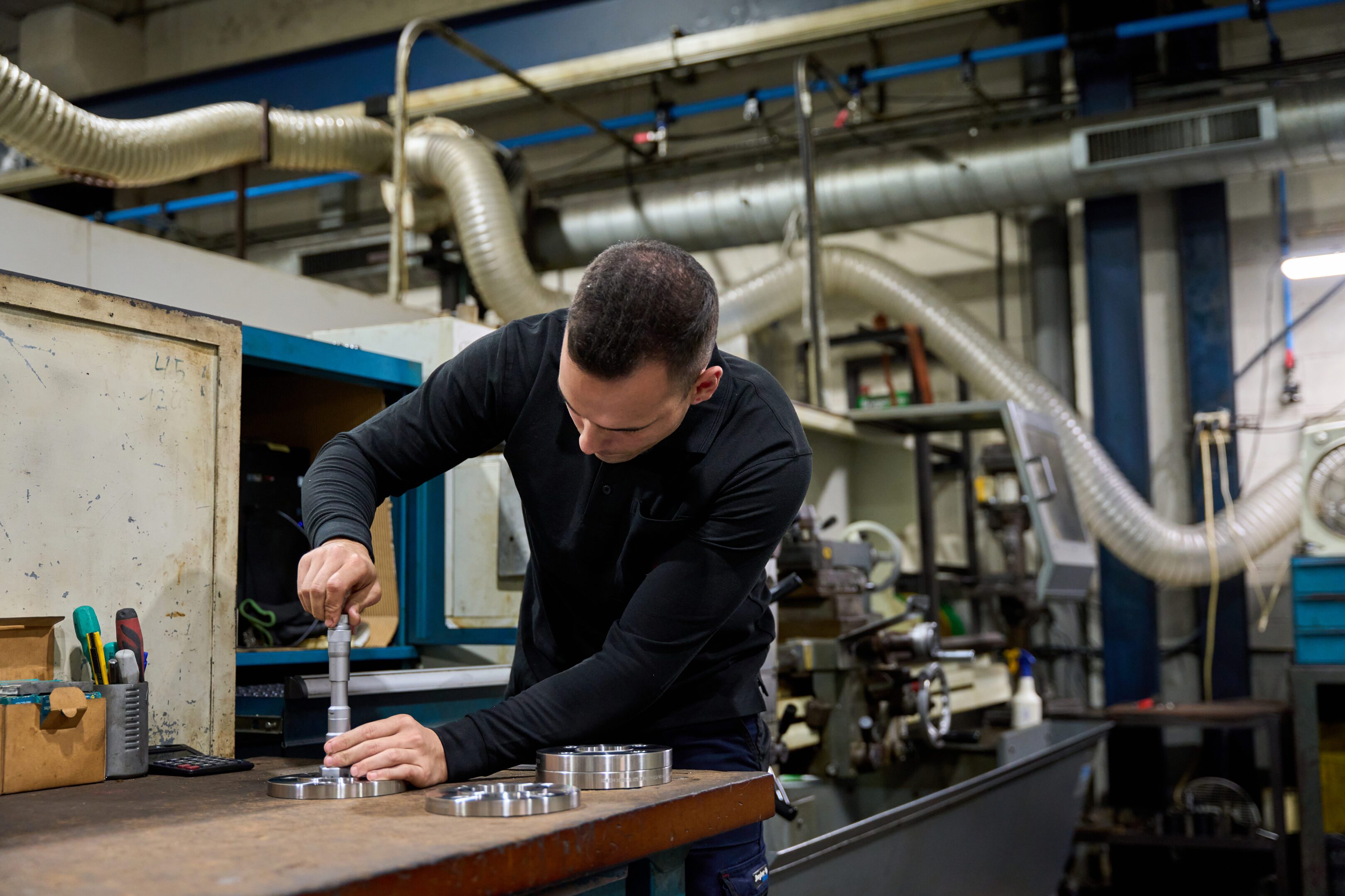 Man working in an industrial workshop.