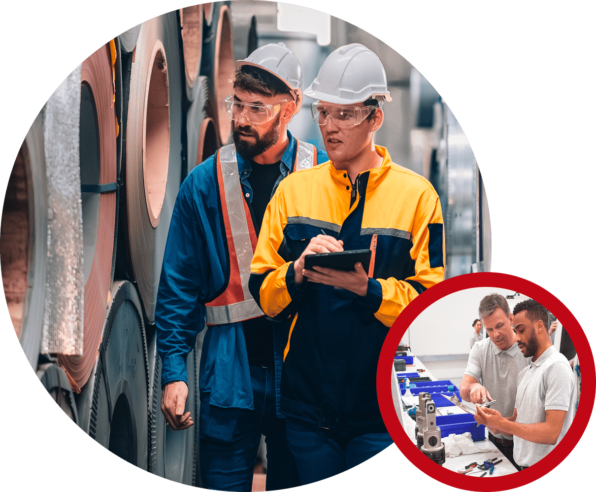 Workers in factory with safety gear.